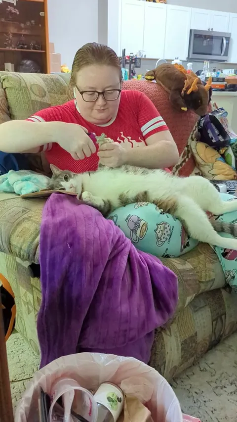 This is how my wife trims Possum's claws. Apparently it doesn't go this well for everyone else? 