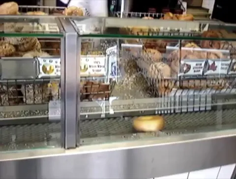 25 years ago a mechanical engineer opened a Boston bagel chain with conveyor-powered “bagel buzzsaws”