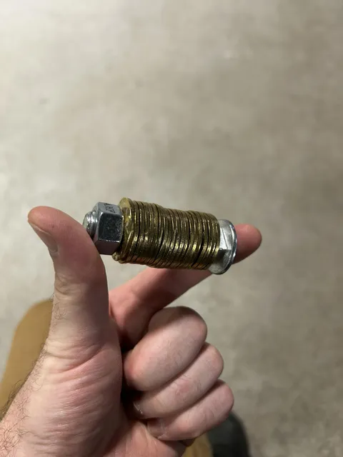 For those not wanting to spend $60-$100 on a metal seed phrase storage, just buy washers and steel letter stampers for under $20. This is 20 full words on 20 washers.