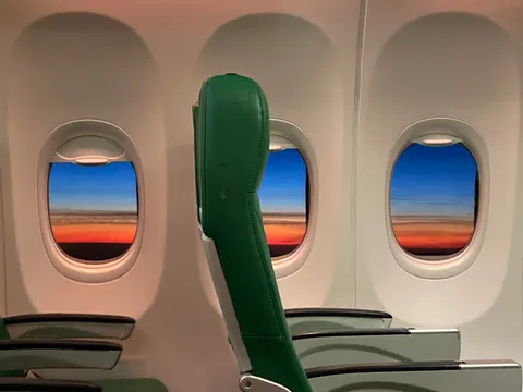 ITAP of the Sunset inside an almost empty plane