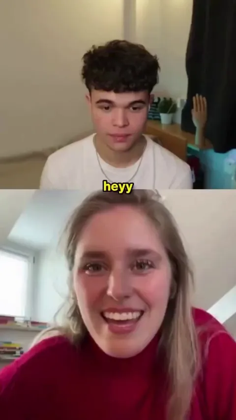 During a omegle video chat, two people share a wholesome moment of surprise and connection after realizing they both have limb differences, smiling and showing their arms proudly.