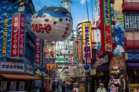 The extremely colourful busy streets of Osaka, Japan, almost burn your retinas