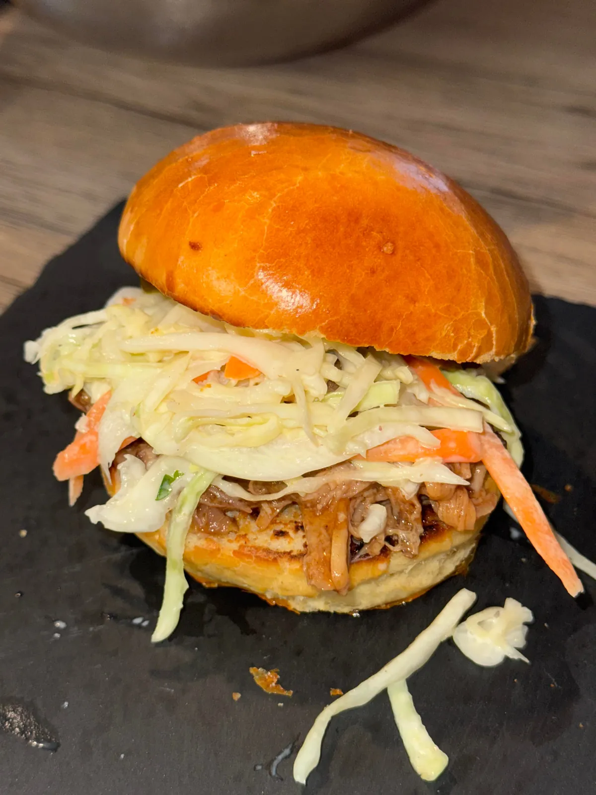 [homemade] pulled pork burgers with brioche buns and coleslaw