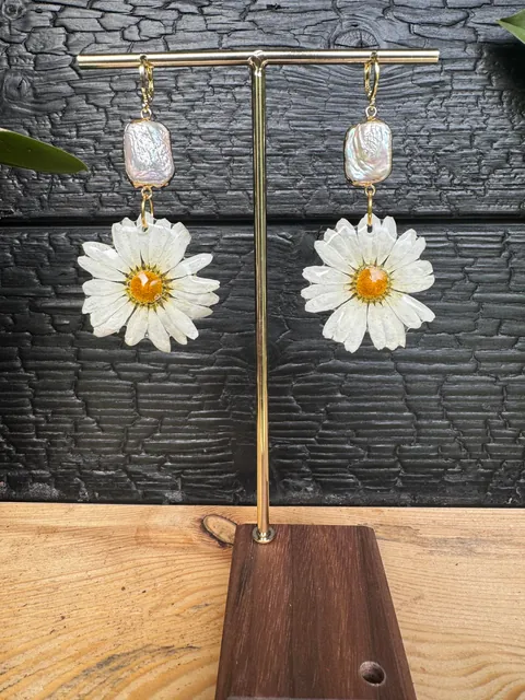 I grow flowers and turn them into jewelry for a living