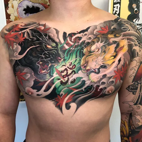 Japanese style Tiger vs. Panther chest piece done by Alex @ Enso Ink in San Diego, CA.