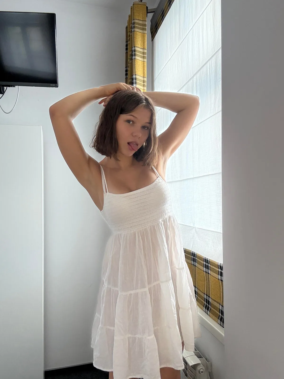 The sun's rays caress my waist