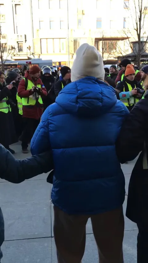 Russian protestors starting to protect each other from visibly nervous police.