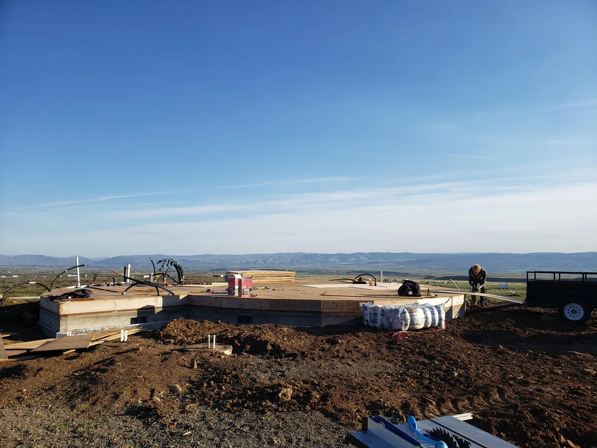 Spent several years building a complete 1300 sq ft roundhouse from top to bottom with my wife, including all framing, electrical, plumbing, HVAC, etc. By far the worst idea we've ever had, and so happy to be in it finally.