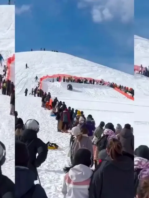 Someone made an inflatable sled of BULLET BILL from Super Mario Bros, it crashed into a group of people at a ski resort in Japan
