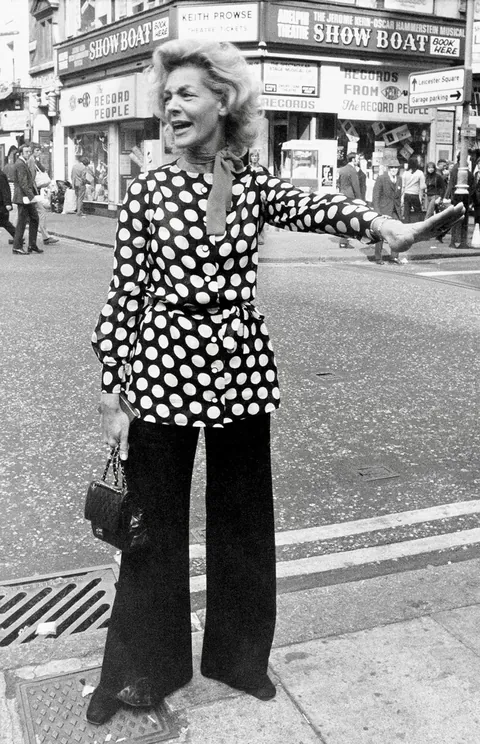Lauren Bacall stopping traffic in London, 1972. She once said of cosmetic surgery, “I think your whole life shows in your face, and you should be proud of that.”