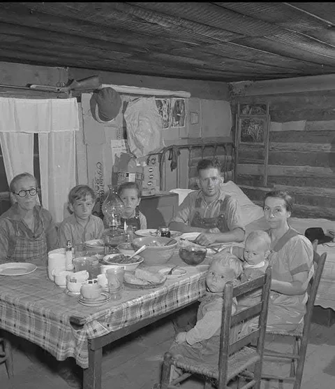 A family from the farm enjoying dinner in 1940.