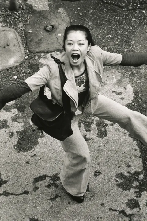 In 1974, Masahisa Fukase photographed his wife, Yōko Wanibe, every morning from the window of their apartment in Tokyo as she left for work.
