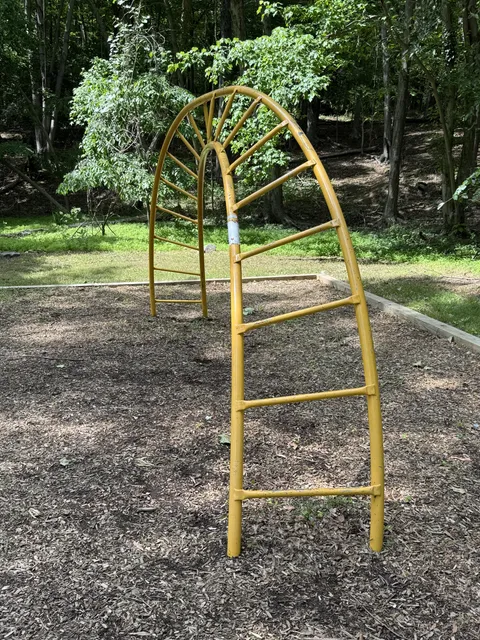[OC] This Möbius strip sort-of monkey bar set in a playground just seems ... mean