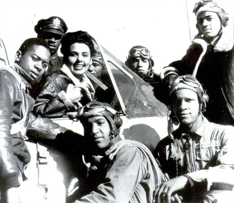 Actress Lena Horne hanging with members of the Tuskegee Airmen at their Alabama base in 1945.