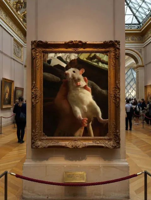 Peachie Puff in "Rodent in Repose". Photoshopped him into the Louvre.