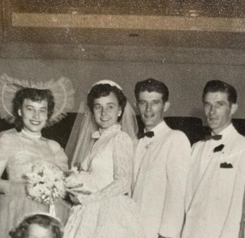 My grandma and her twin next to my grandpa and his twin on their wedding day. Early 1950s.