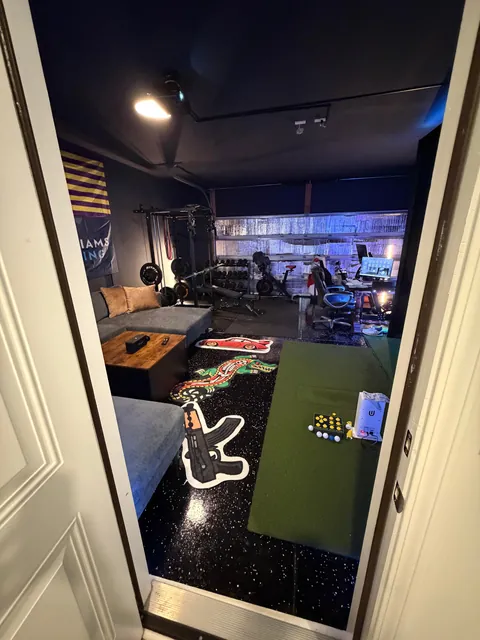 Basic two-car garage to a financial mistake I can hit golf balls and race in