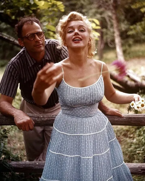 Marilyn Monroe and her husband Arthur Miller were photographed at their home in Amagansett,1957