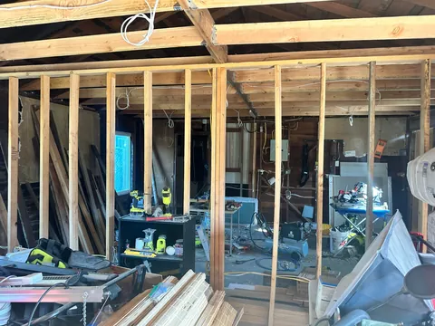 Turned my 1903 three car garage into 1/2 garage and 1/2 bedroom and bathroom my