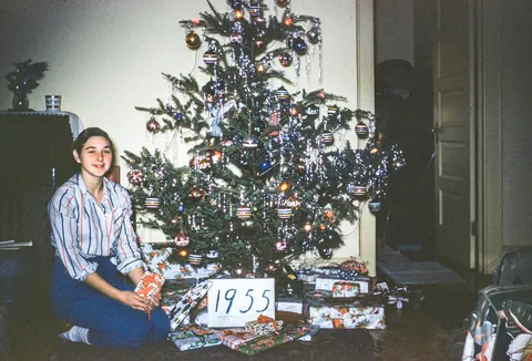 Young lady giving a smile 70 years ago, December of 1955.
