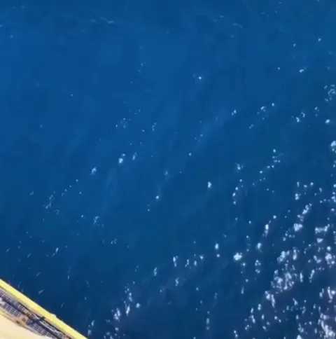 What happens when you throw an apple from an offshore oil rig