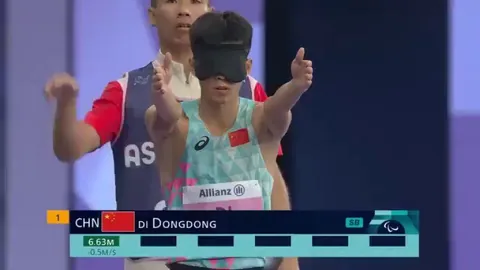 Blind Paralympics long jumper in action 