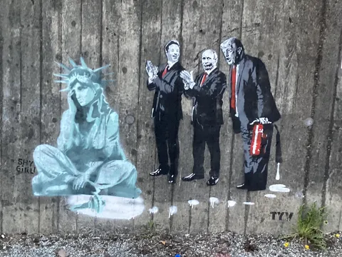 New street art on a wall near my house showed up two nights ago.
