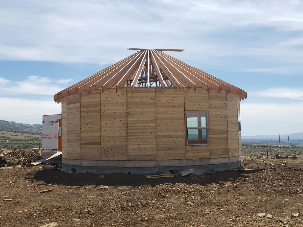 Spent several years building a complete 1300 sq ft roundhouse from top to bottom with my wife, including all framing, electrical, plumbing, HVAC, etc. By far the worst idea we've ever had, and so happy to be in it finally.