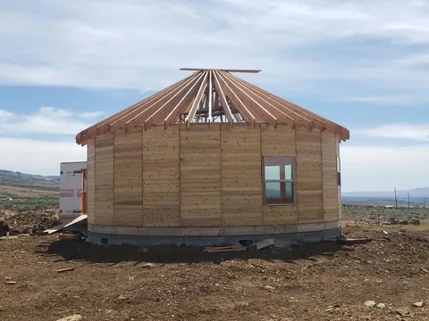 Spent several years building a complete 1300 sq ft roundhouse from top to bottom with my wife, including all framing, electrical, plumbing, HVAC, etc. By far the worst idea we've ever had, and so happy to be in it finally.