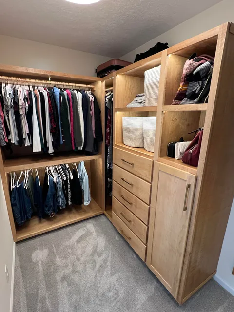 I made custom master closet built-ins with maple and maple plywood, LED lighting