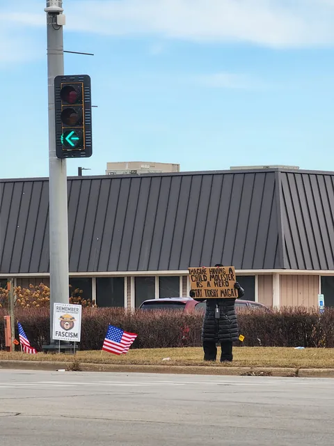 One woman protest in a predominantly Republican area. Never stop fighting.