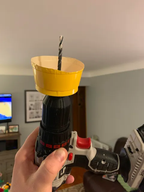 Drilling a hole in a ceiling? This saves from dust debris!