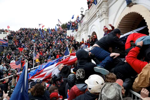 Pro-Trump insurrectionists storm the U.S. Capitol to prevent certification of the election on Jan 6