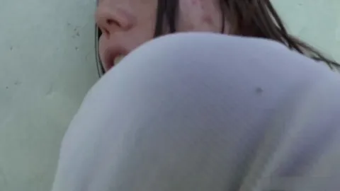 In front of her Mother