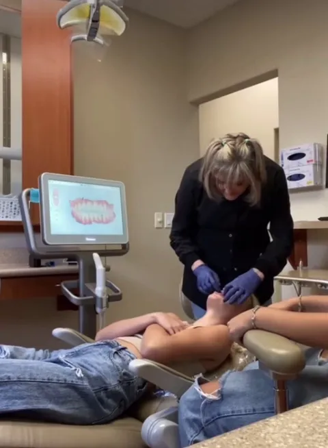 Her moms reaction to seeing her lip tattoo that says daddy