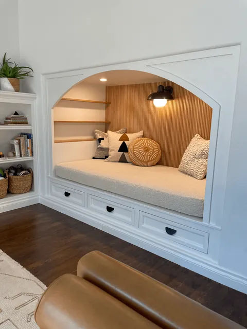 We transformed our 90s entertainment center in a reading nook