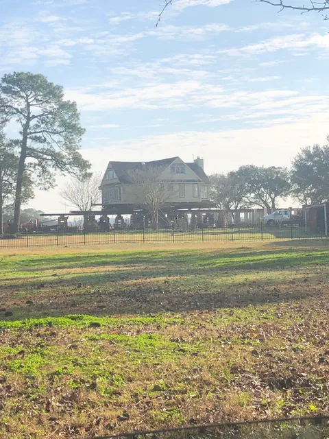 My neighbors are moving their entire house back 200ft.