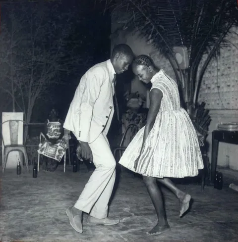 Young couple at a club in Mali. Photo by Malick Sidibé Dec. 24, 1963