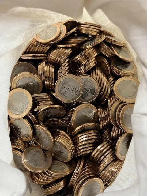 Not a sight you see everyday: a bag of shiny new 20 peso coins