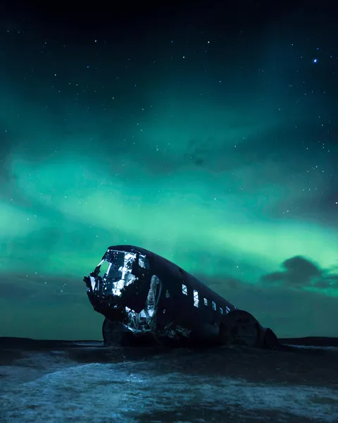 ITAP of a crashed plane under the Northern Lights