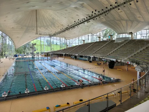 The Olympia Schwimmhalle (Olympic swimming pool), located in Olympiapark in Munich, Germany. The building is famous for its tent-like roof, a light and transparent structure characteristic of the entire Munich Olympic Park. [OC]