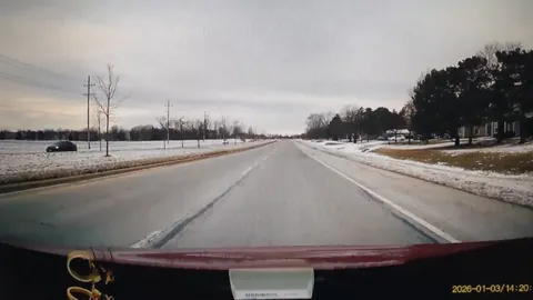 Driver ignores stop sign to merge in both lanes and almost causes accident. [OC]