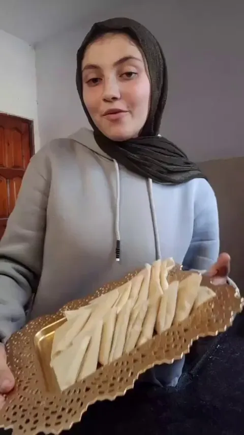 A little girl filming herself cooking when an air strike hit near her