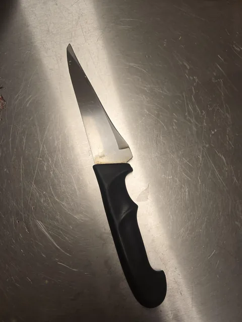 My FIL's kitchen knife he's been hand sharpening since the late 70's.
