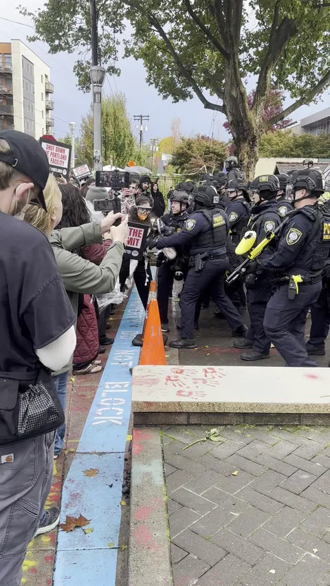 [OC] DHS agents pull I.C.E. protester across the blue line and then arrest her for "trespassing"