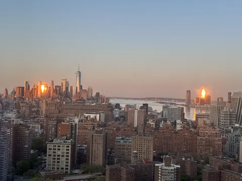 The sun being reflected by only two buildings out of hundreds at 6am.