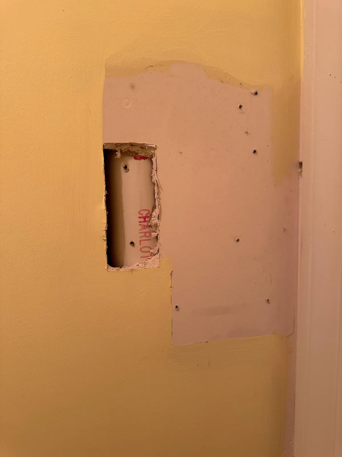 Pulled an old ADT security system off the wall and found out they drilled through the upstairs drain pipe. Can I use something to patch this?