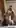 Naughty mom in the bathroom while the family's right behind the wall