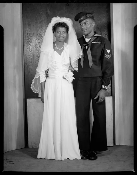 Young couple at their wedding (a war wedding) circa 1940s.