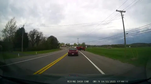 [OC] My brother's cam - impatient driver tries to pass a tractor
